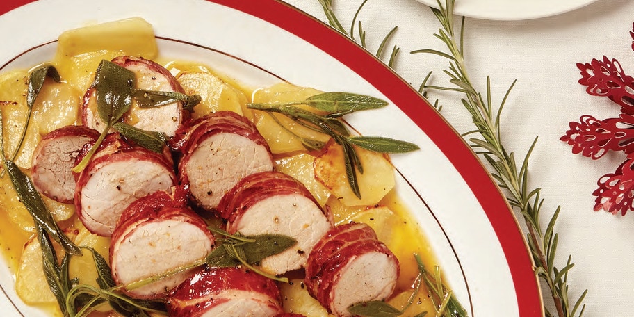 Mușchiuleț de porc cu portocale și cartofi la cuptor